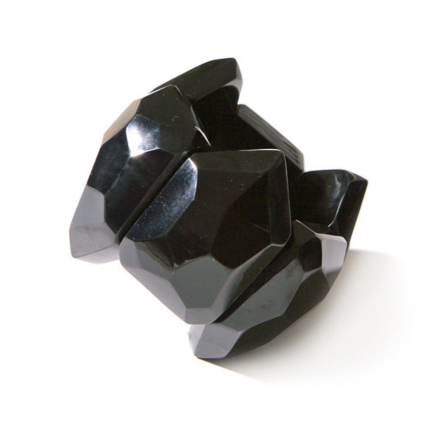 FACETED STATEMENT CUFF. BLACK