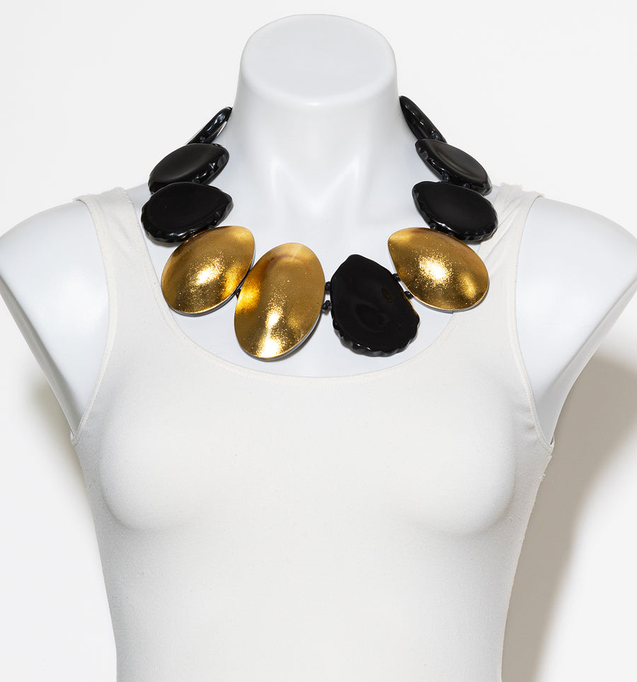LARGE PETAL STATEMENT NECKLACE. BLACK/GOLD