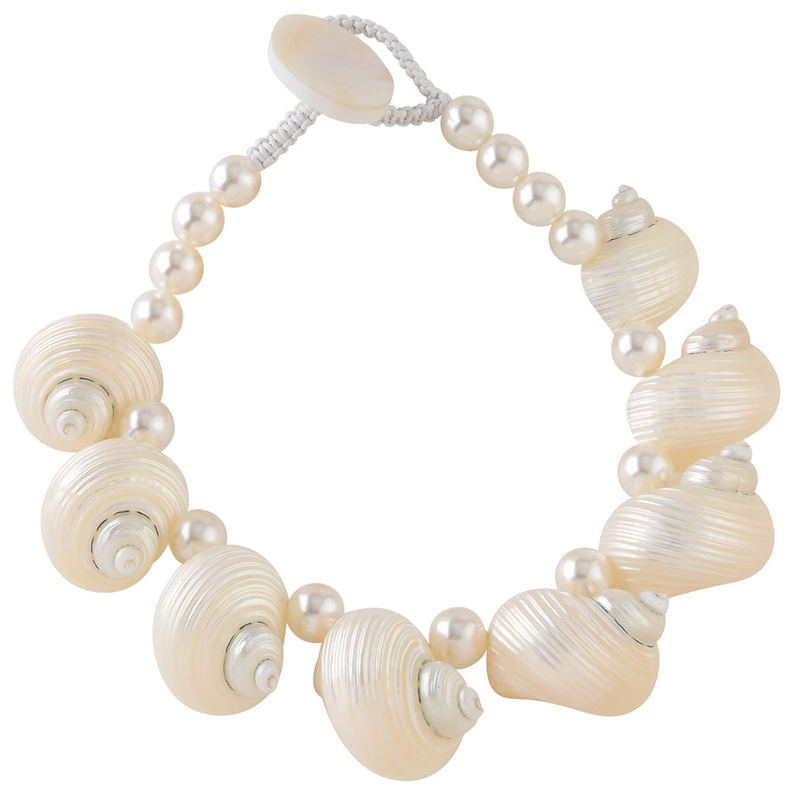 TURBO SHELL, FAUX PEARL AND MOP STATEMENT NECKLACE. CREAM/WHITE