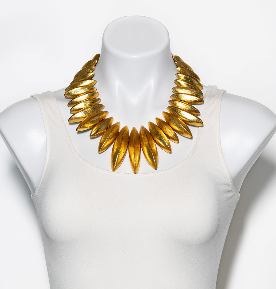 GOLD SLICE STATEMENT NECKLACE. GOLD